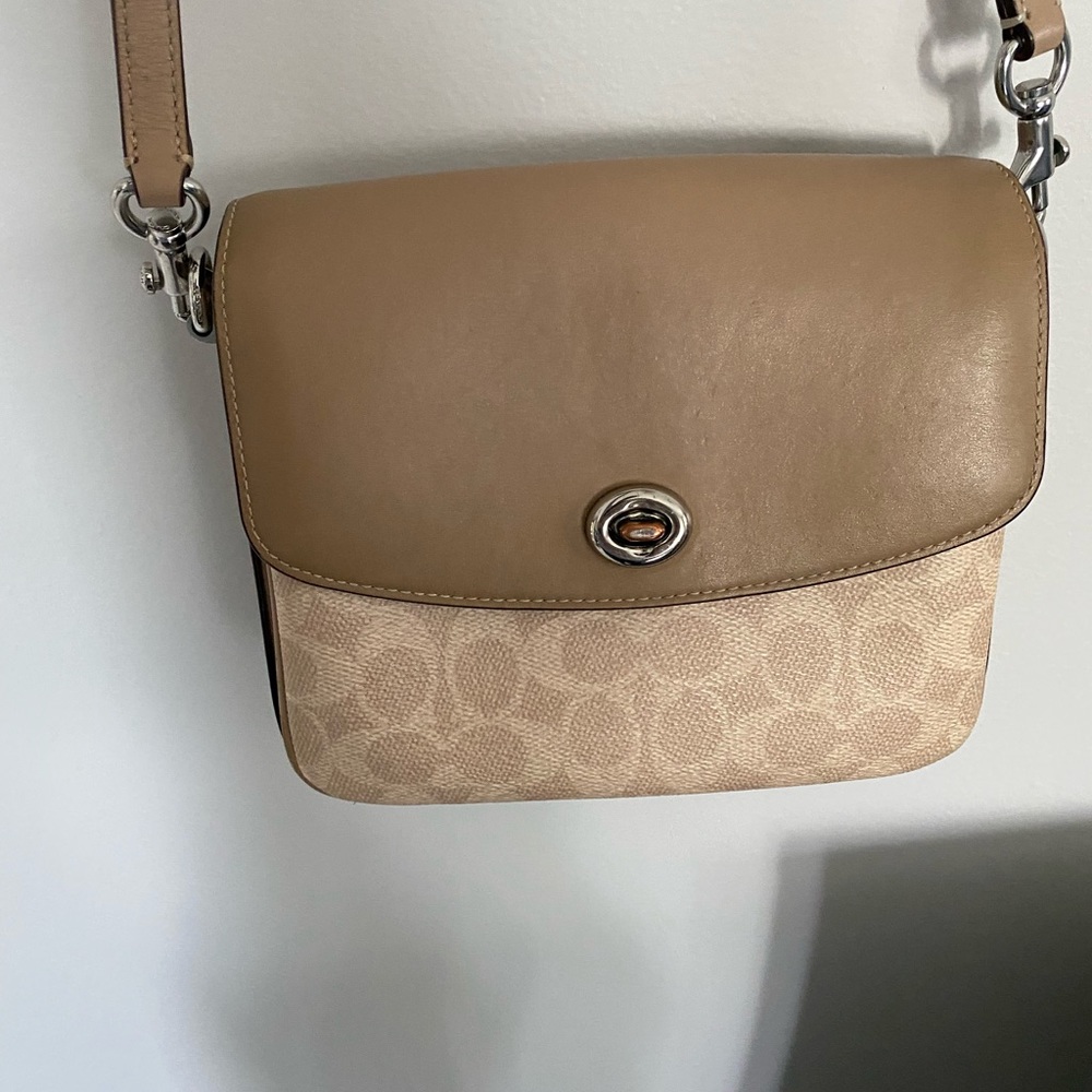 I am selling this Coach bag.I want to get rid of it fast make me an offer!